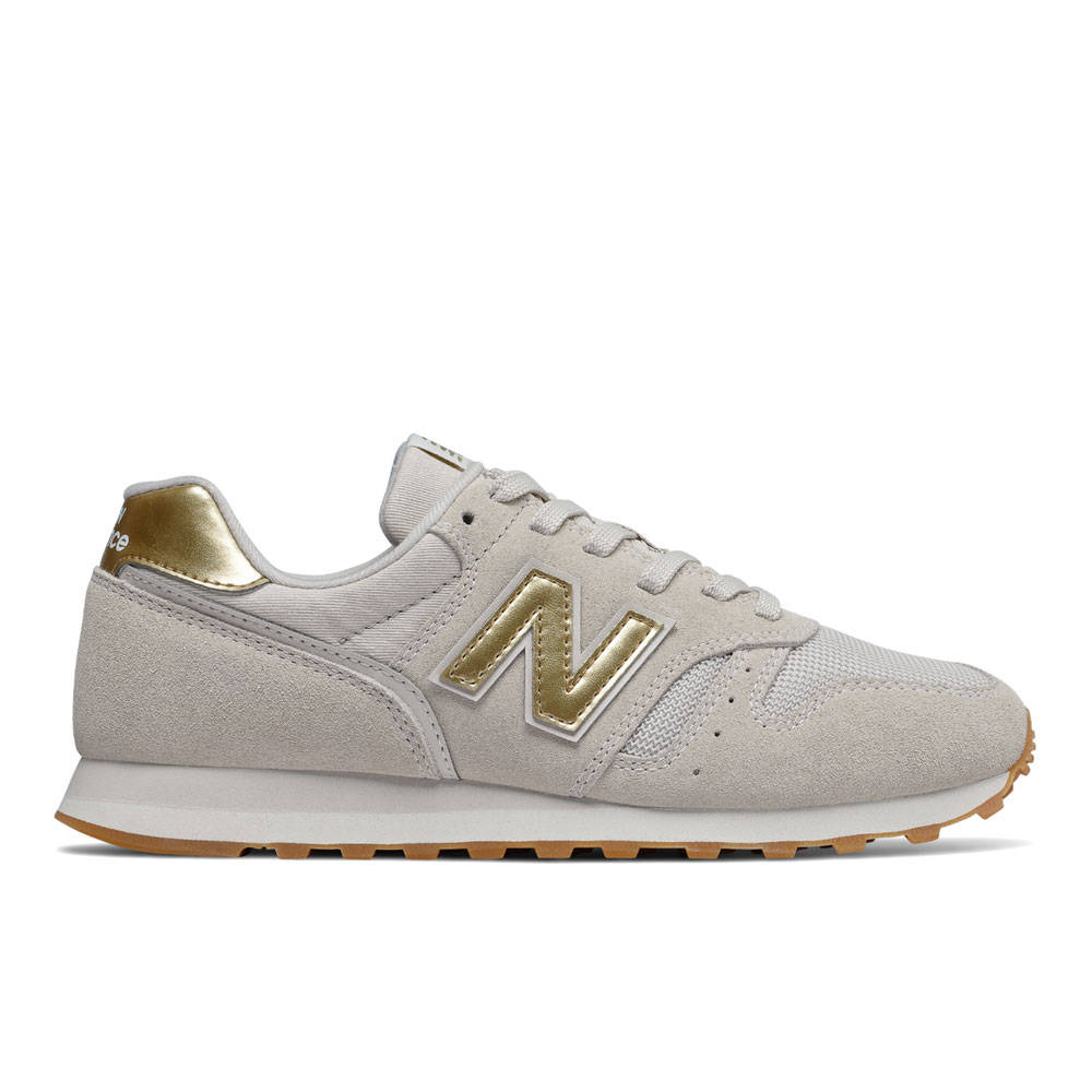 new balance dourado